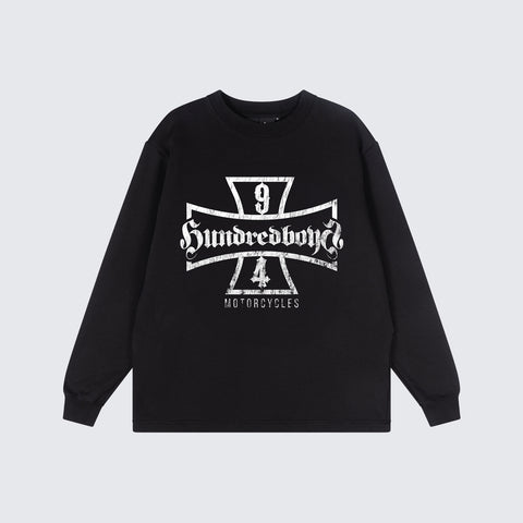 The Hundredboyz HB SHIELD SWEATER, a collaboration between Ninetyfour and Hundredboyz. Crafted from premium fleece cotton with its vintage effect overlaying the logo within a shield motif. 