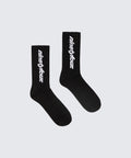 The Ninetyfour DEBUT SOCKS in BLACK, a perfect blend of comfort and style. Crafted from high-quality materials, these socks feature our distinctive white Fundamentals logo.